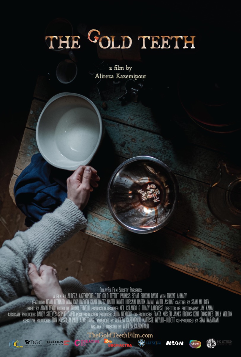 The Gold Teeth (2022) — film poster. Dark and moody, hands over a bowl, amber typography.